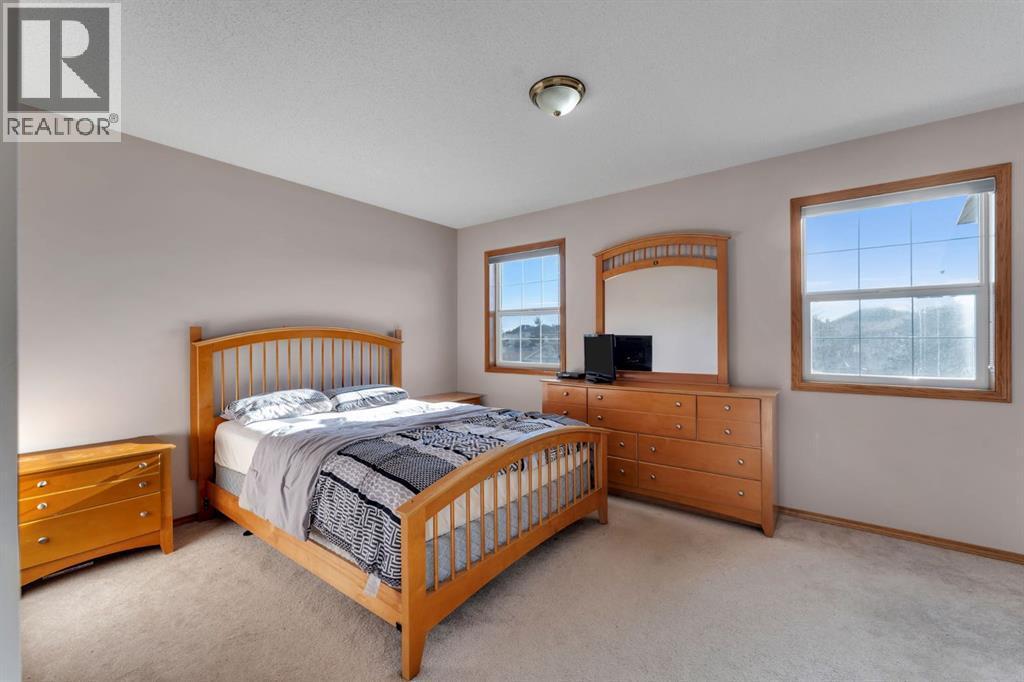 717 Coral Springs Boulevard Ne, Calgary, AB - Indoor Photo Showing Bedroom