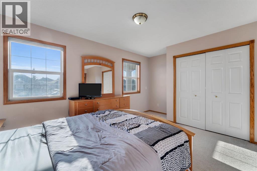 717 Coral Springs Boulevard Ne, Calgary, AB - Indoor Photo Showing Bedroom