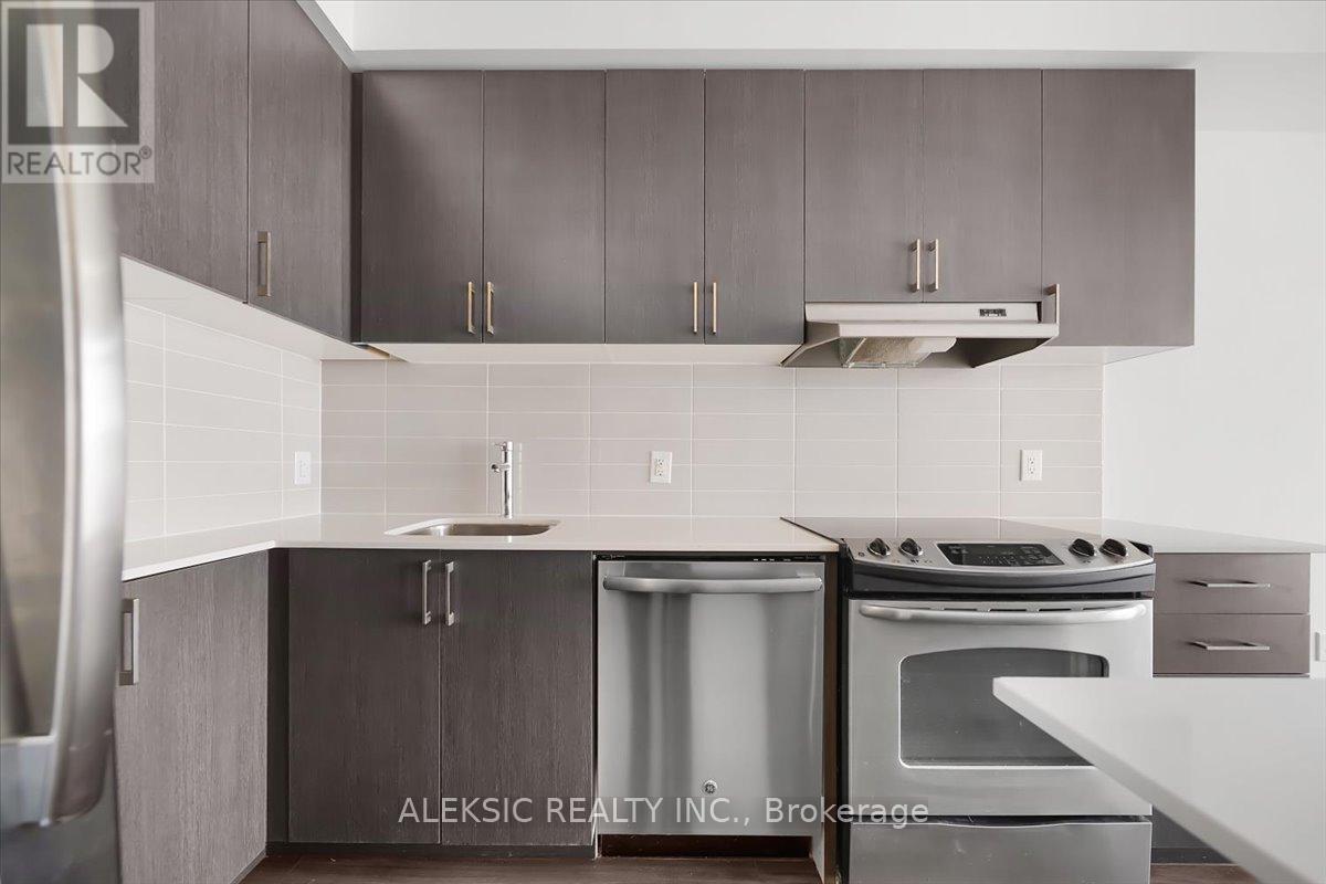 2203 - 2560 Eglinton Avenue, Mississauga, ON - Indoor Photo Showing Kitchen With Upgraded Kitchen