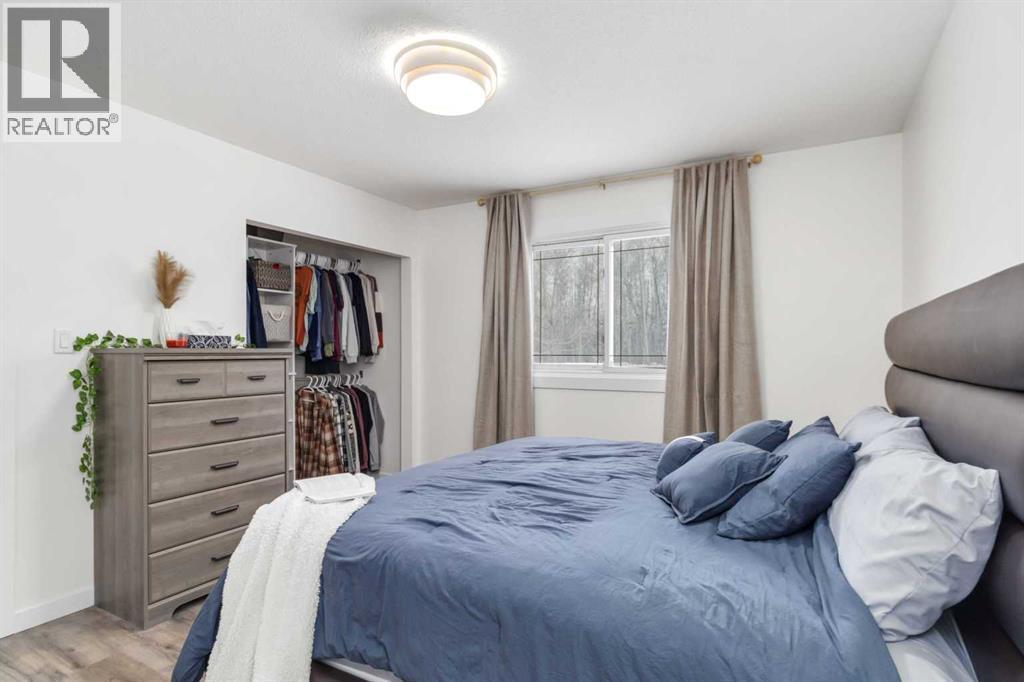 Primary bedroom with KING bed - 247 Cornwall Drive, Fort Mcmurray, AB - Indoor Photo Showing Bedroom