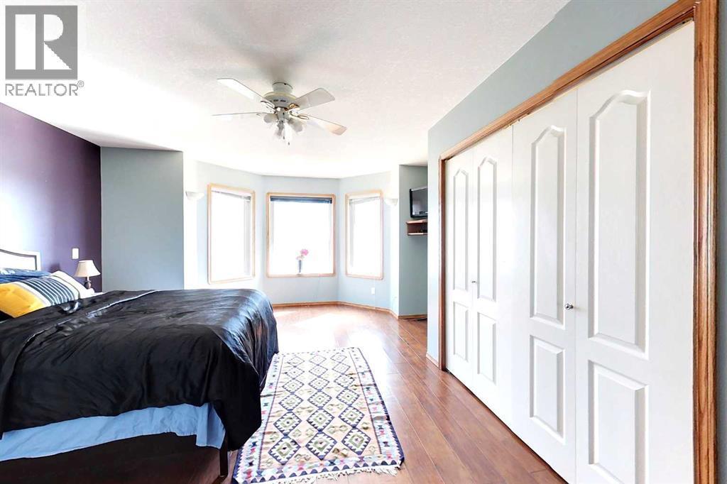 23 Springwood Drive Ne, Slave Lake, AB - Indoor Photo Showing Bedroom