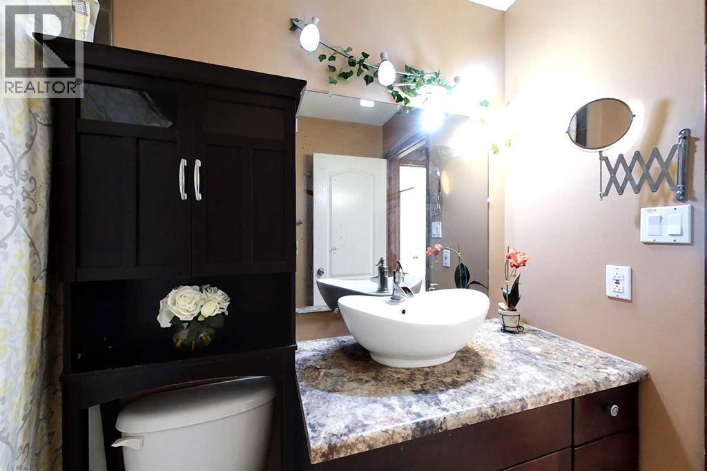 23 Springwood Drive Ne, Slave Lake, AB - Indoor Photo Showing Bathroom