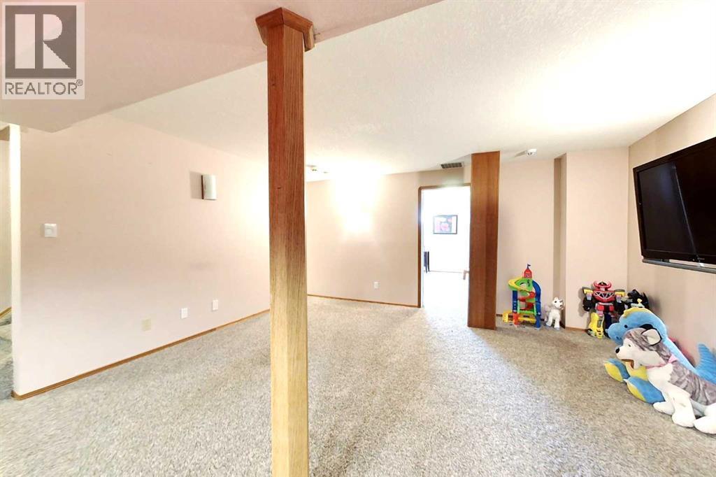 23 Springwood Drive Ne, Slave Lake, AB - Indoor Photo Showing Other Room