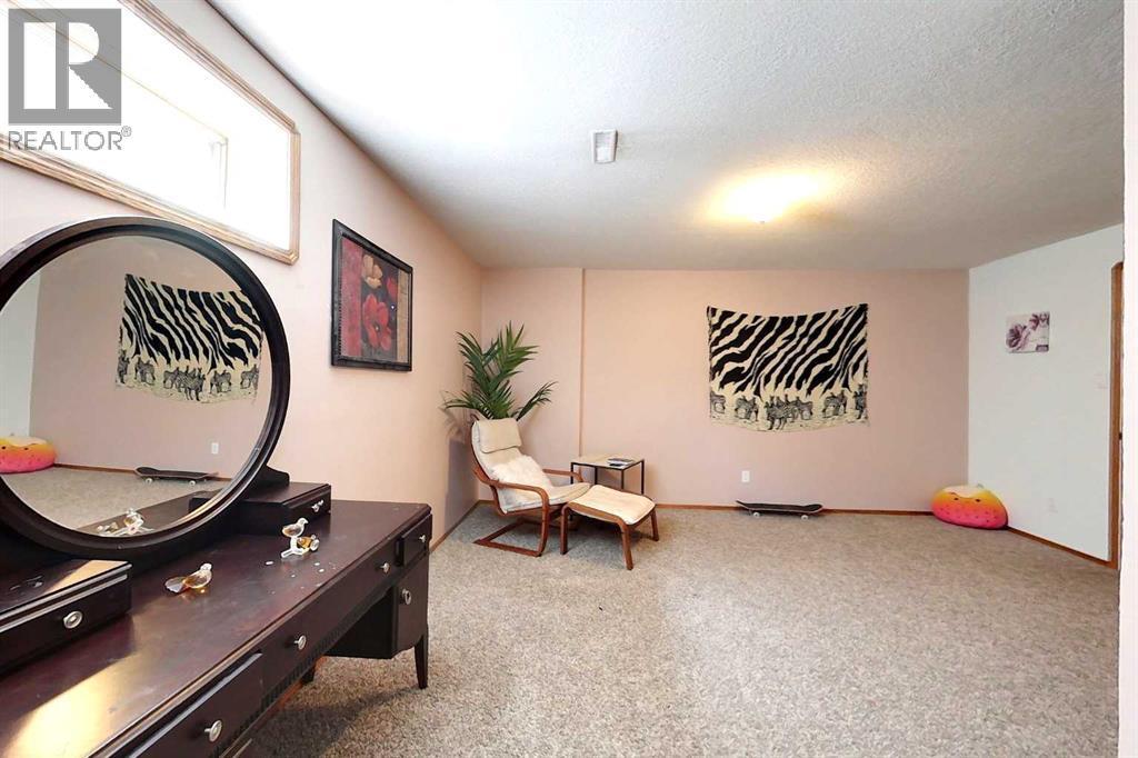 23 Springwood Drive Ne, Slave Lake, AB - Indoor Photo Showing Other Room