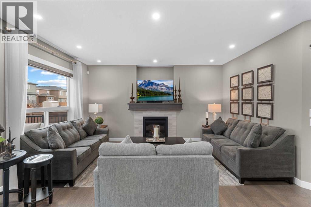 134 Cornerstone Circle Ne, Calgary, AB - Indoor Photo Showing Living Room With Fireplace