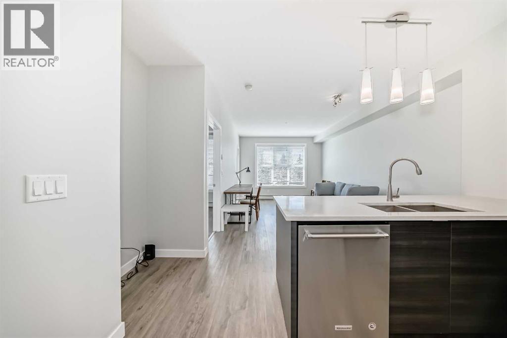 3210, 95 Burma Star Road Sw, Calgary, AB - Indoor Photo Showing Kitchen With Double Sink