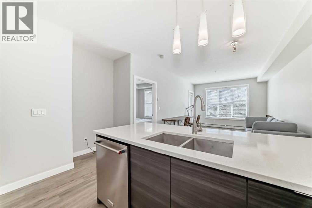 3210, 95 Burma Star Road Sw, Calgary, AB - Indoor Photo Showing Kitchen With Double Sink