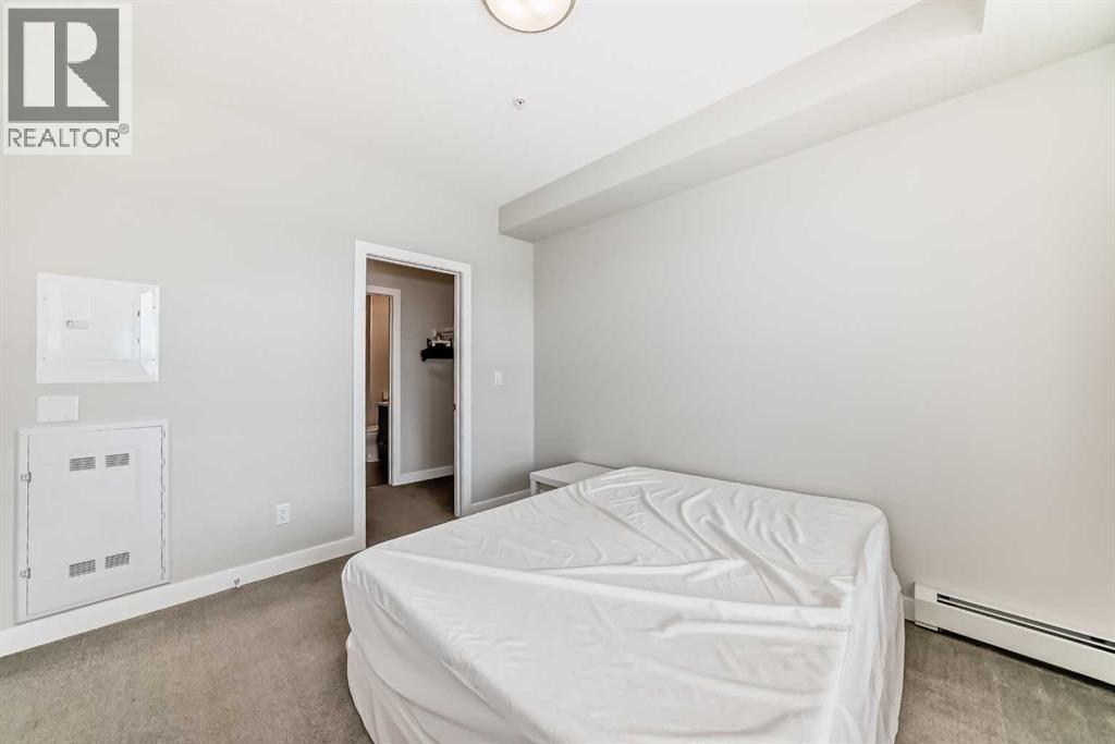 3210, 95 Burma Star Road Sw, Calgary, AB - Indoor Photo Showing Bedroom