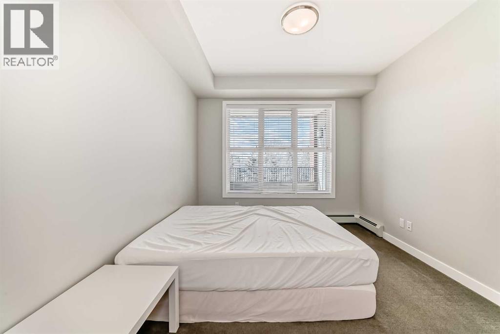 3210, 95 Burma Star Road Sw, Calgary, AB - Indoor Photo Showing Bedroom