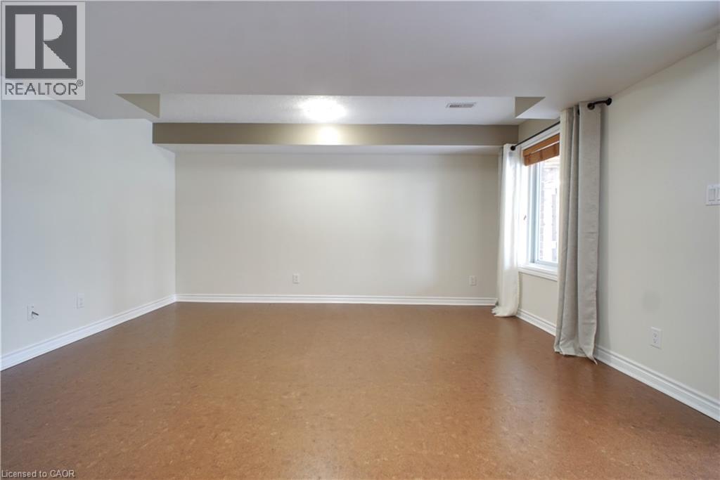 Spare room with baseboards - 919 Zeller Crescent, Kitchener, ON - Indoor Photo Showing Other Room