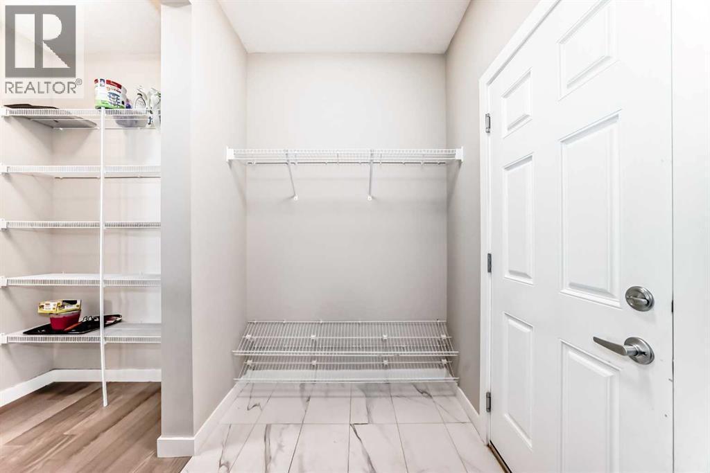 41 Shawnee Green Sw, Calgary, AB - Indoor Photo Showing Other Room