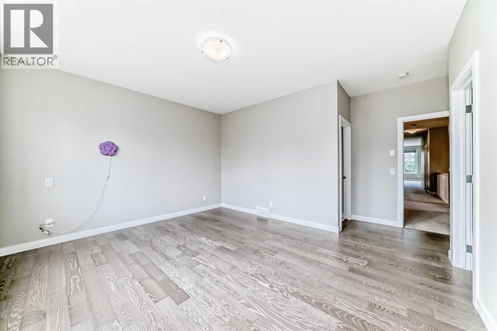 41 Shawnee Green Sw, Calgary, AB - Indoor Photo Showing Other Room