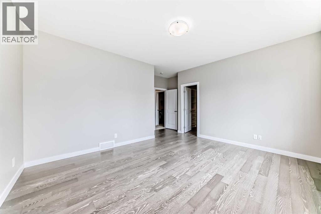 41 Shawnee Green Sw, Calgary, AB - Indoor Photo Showing Other Room