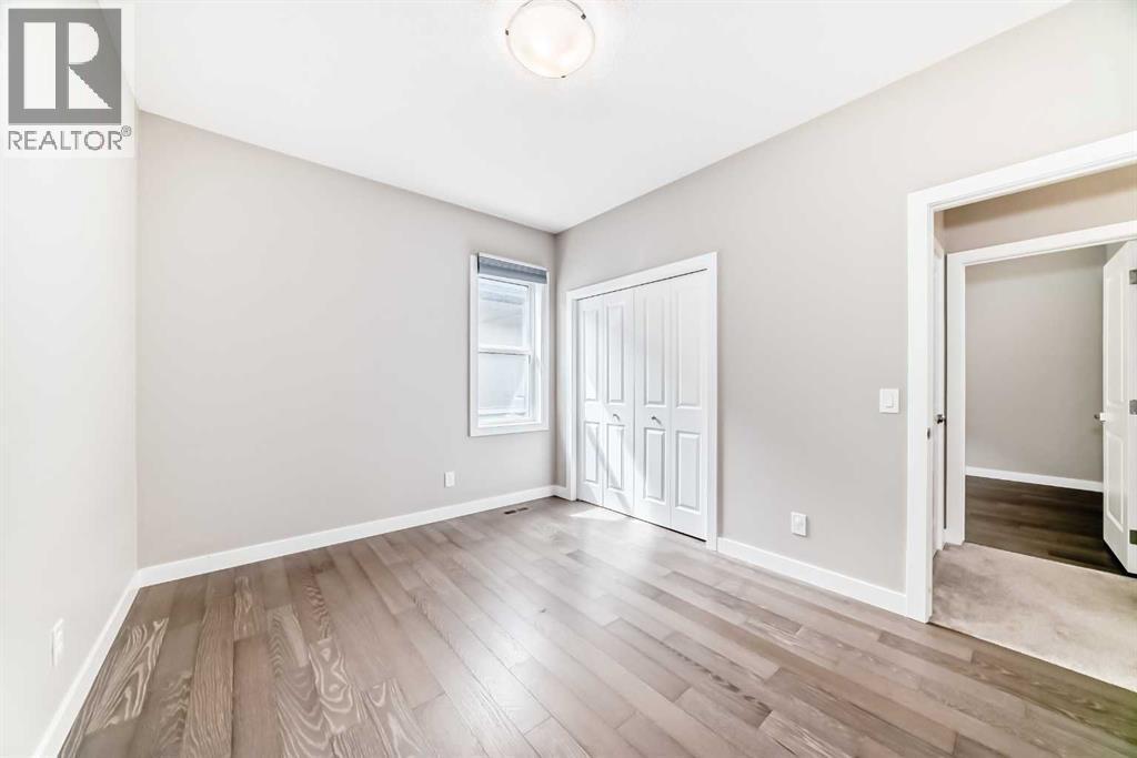 41 Shawnee Green Sw, Calgary, AB - Indoor Photo Showing Other Room