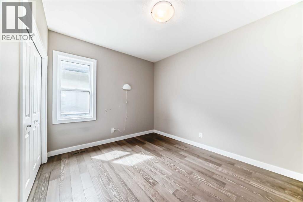 41 Shawnee Green Sw, Calgary, AB - Indoor Photo Showing Other Room