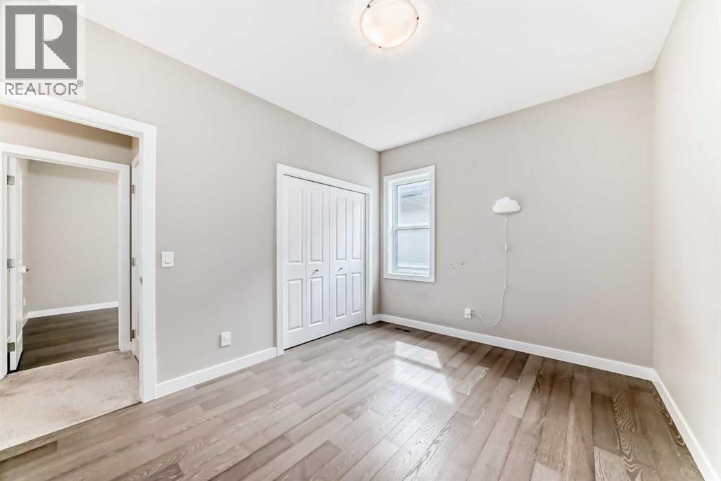 41 Shawnee Green Sw, Calgary, AB - Indoor Photo Showing Other Room