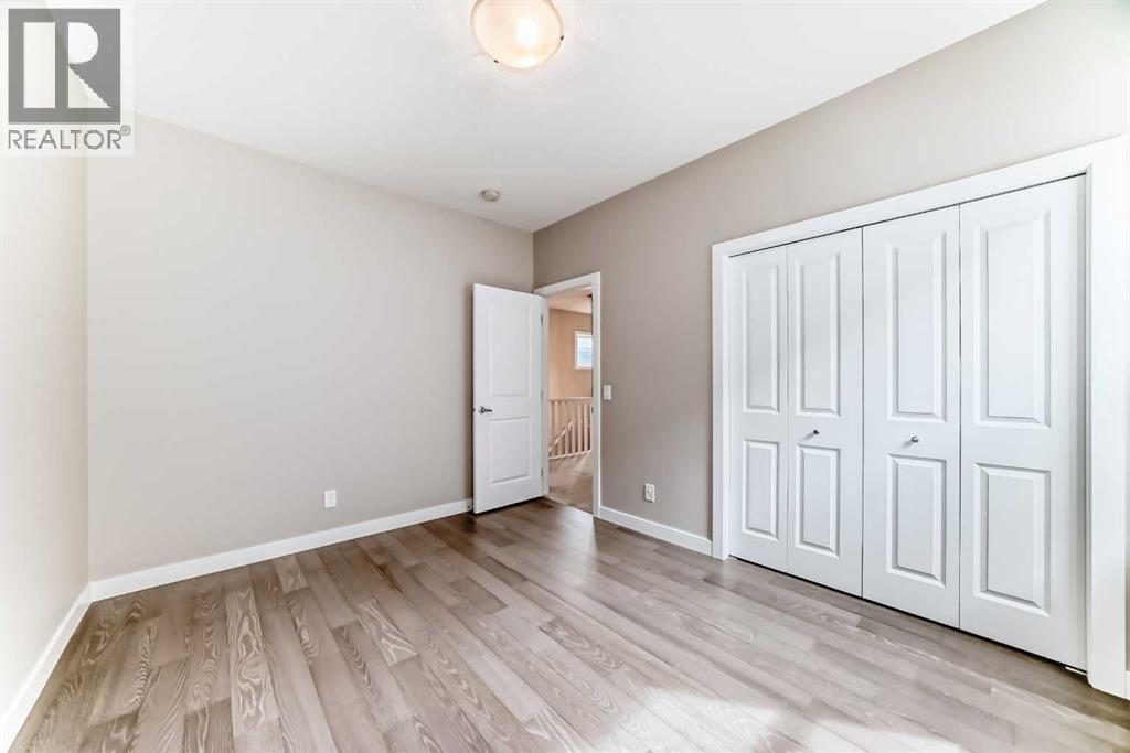 41 Shawnee Green Sw, Calgary, AB - Indoor Photo Showing Other Room