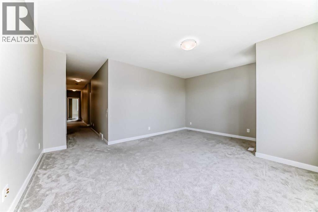 41 Shawnee Green Sw, Calgary, AB - Indoor Photo Showing Other Room