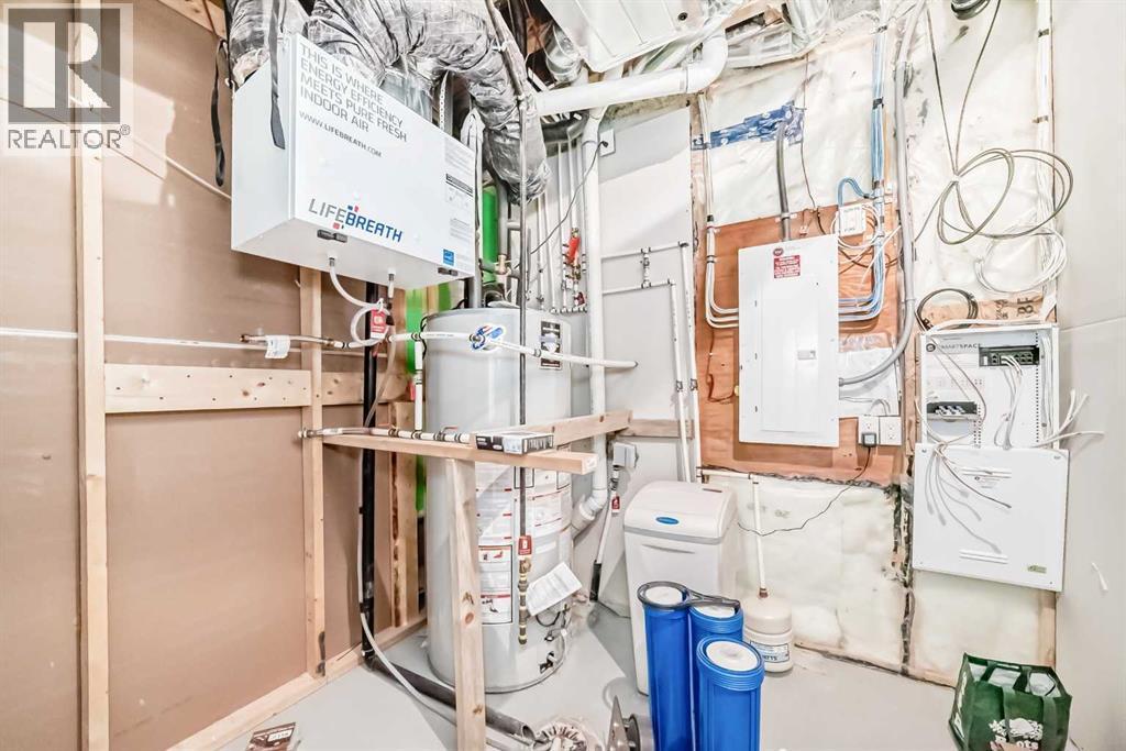 41 Shawnee Green Sw, Calgary, AB - Indoor Photo Showing Basement