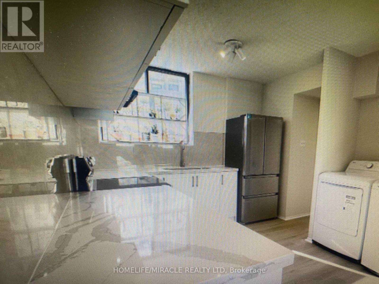 303 - 665 Kennedy Road, Toronto, ON - Indoor Photo Showing Laundry Room