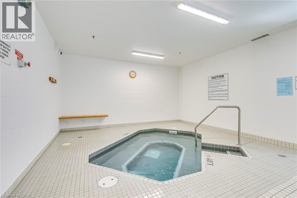 5080 Pinedale Avenue Unit# 902, Burlington, ON - Indoor Photo Showing Other Room With In Ground Pool