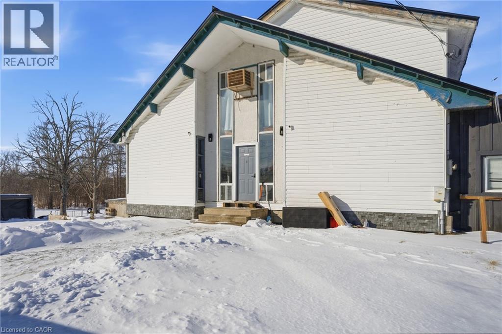 View of snow covered rear of property - 4905 #3 Highway, Cayuga, ON