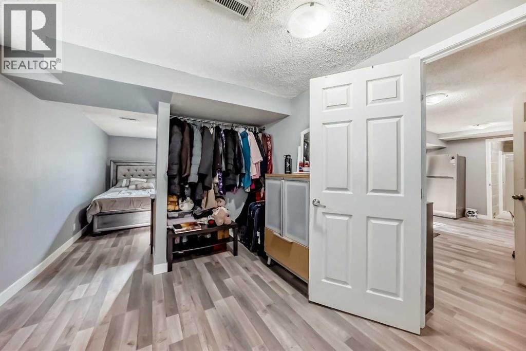 Closet area of 1 BR in Legal Suite - 216 Pinecrest Crescent Ne, Calgary, AB - Indoor