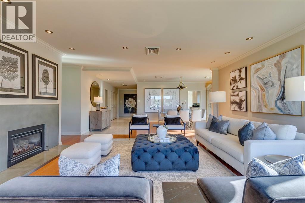 3N, 222 Eagle Ridge Drive Sw, Calgary, AB - Indoor Photo Showing Living Room With Fireplace