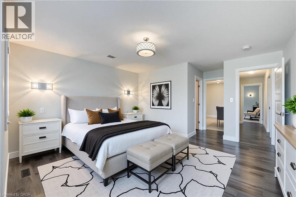 Bedroom featuring dark wood-style floors - 2527 Holbrook Drive, London, ON - Indoor Photo Showing Bedroom