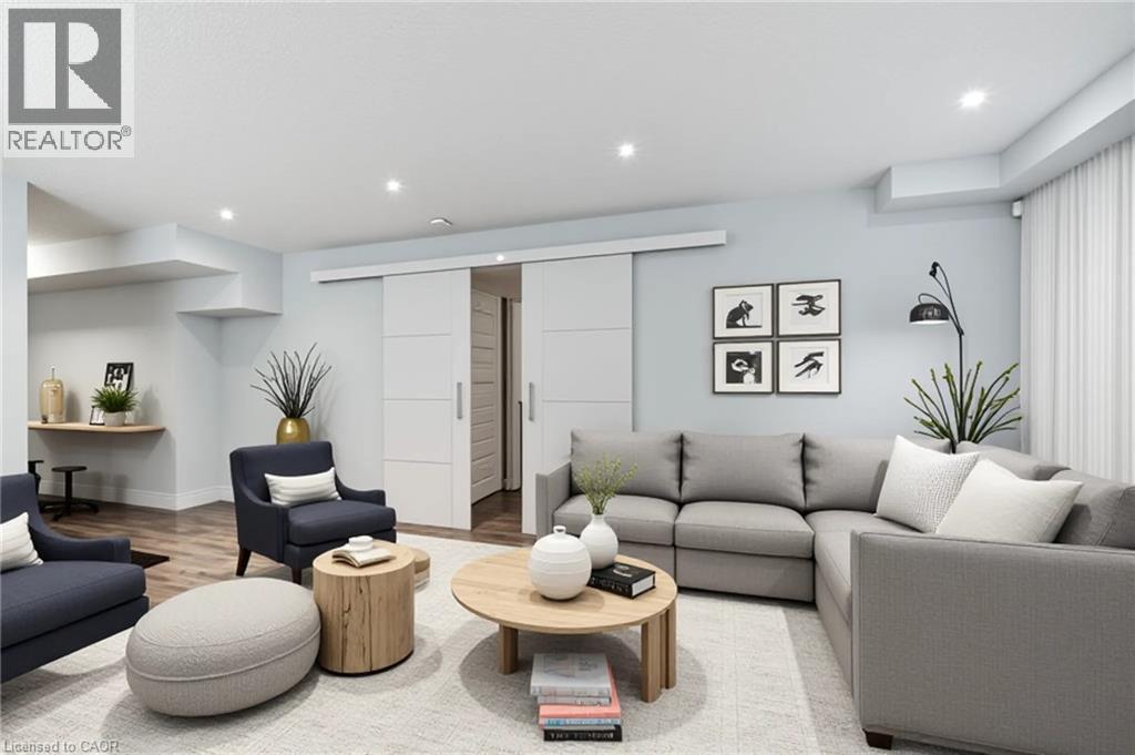 Living area with wood finished floors and recessed lighting - 2527 Holbrook Drive, London, ON - Indoor Photo Showing Living Room
