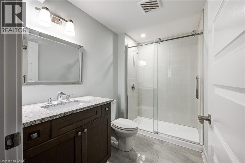 Full bathroom with a shower stall, vanity, and recessed lighting - 2527 Holbrook Drive, London, ON - Indoor Photo Showing Bathroom