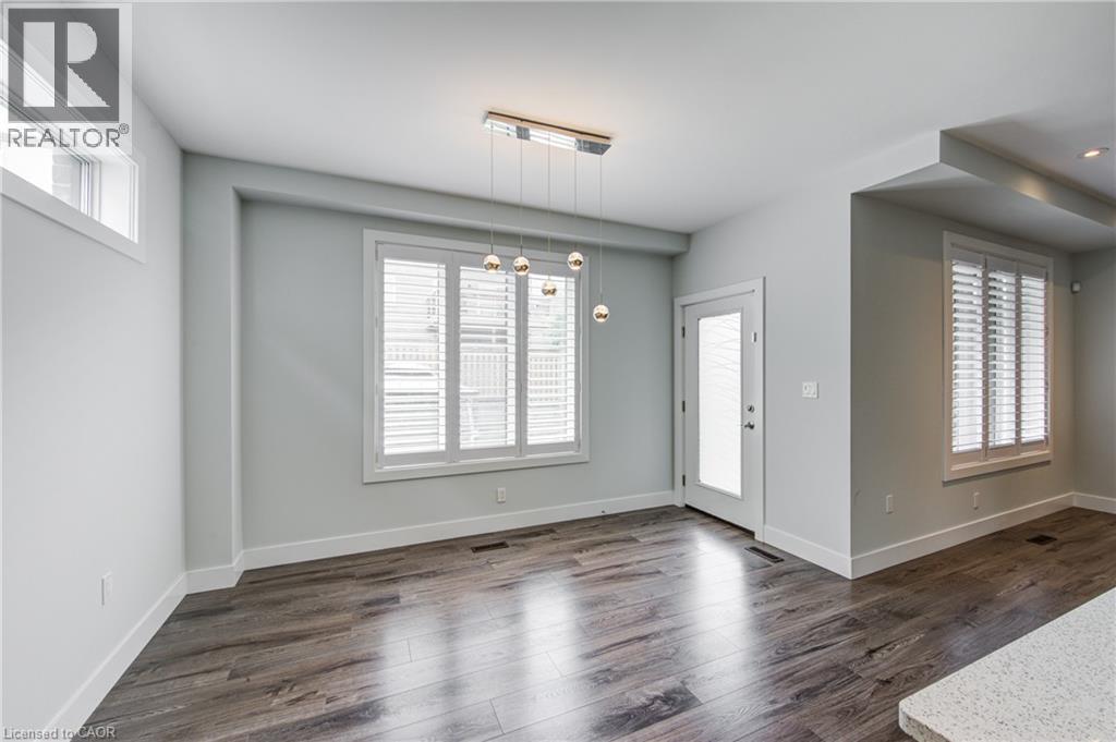 Entryway featuring dark wood finished floors - 2527 Holbrook Drive, London, ON - Indoor Photo Showing Other Room