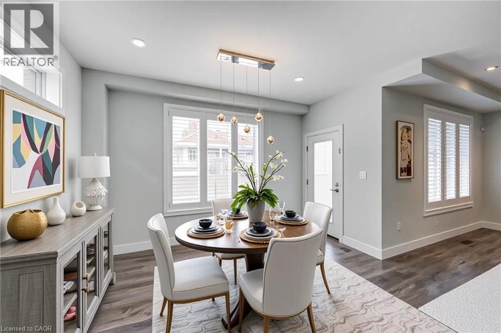 Dining room featuring dark wood finished floors and recessed lighting - 2527 Holbrook Drive, London, ON - Indoor Photo Showing Dining Room