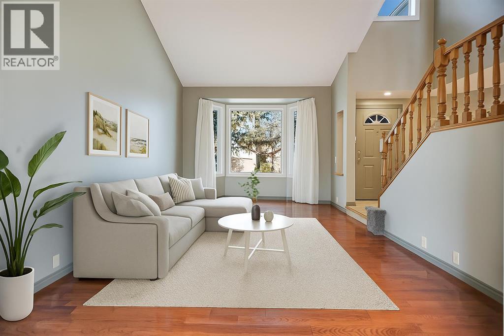 107 Wood Valley Drive Sw, Calgary, AB - Indoor Photo Showing Living Room