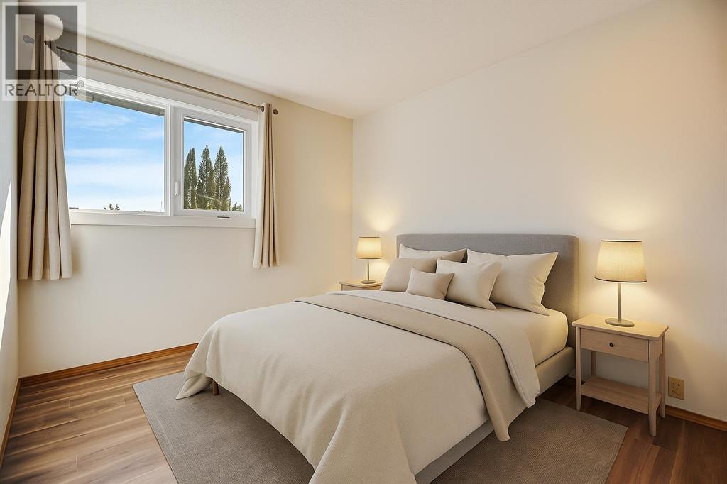 107 Wood Valley Drive Sw, Calgary, AB - Indoor Photo Showing Bedroom