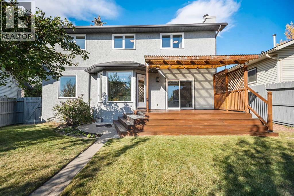 107 Wood Valley Drive Sw, Calgary, AB - Outdoor With Deck Patio Veranda