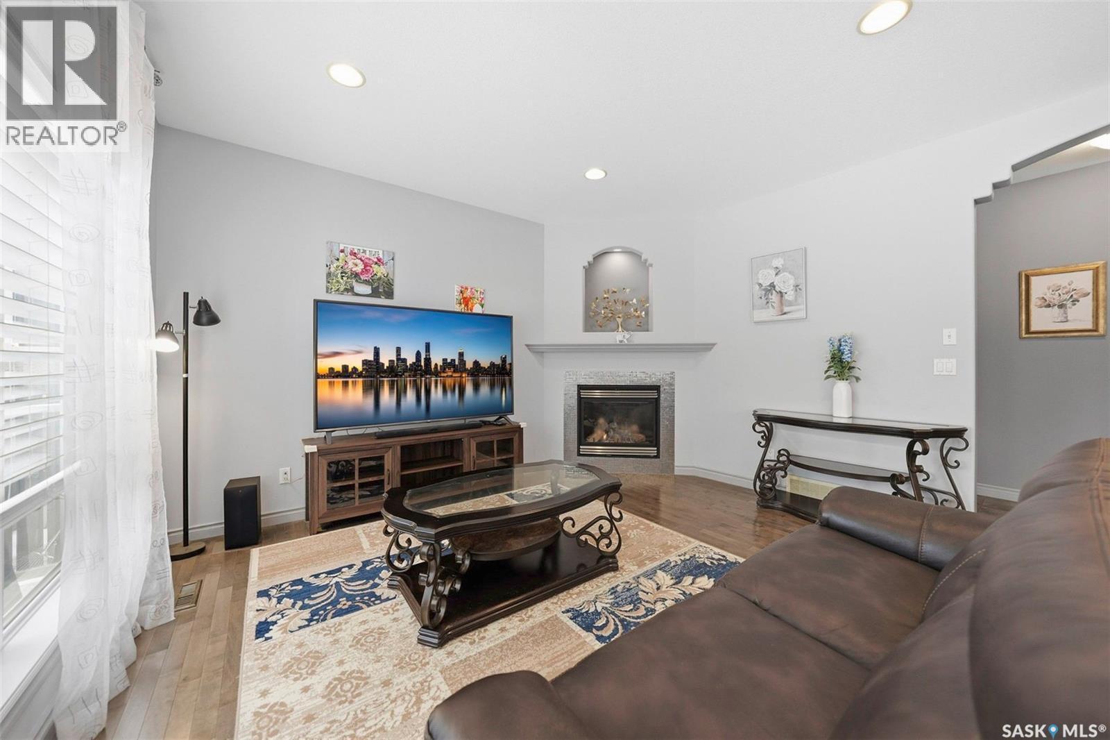 218 Brookshire Crescent, Saskatoon, SK - Indoor Photo Showing Living Room With Fireplace