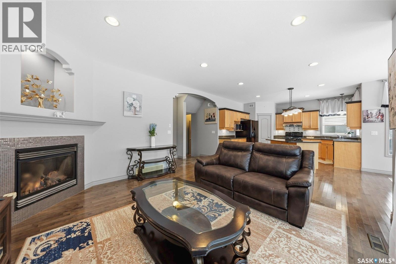 218 Brookshire Crescent, Saskatoon, SK - Indoor Photo Showing Living Room With Fireplace