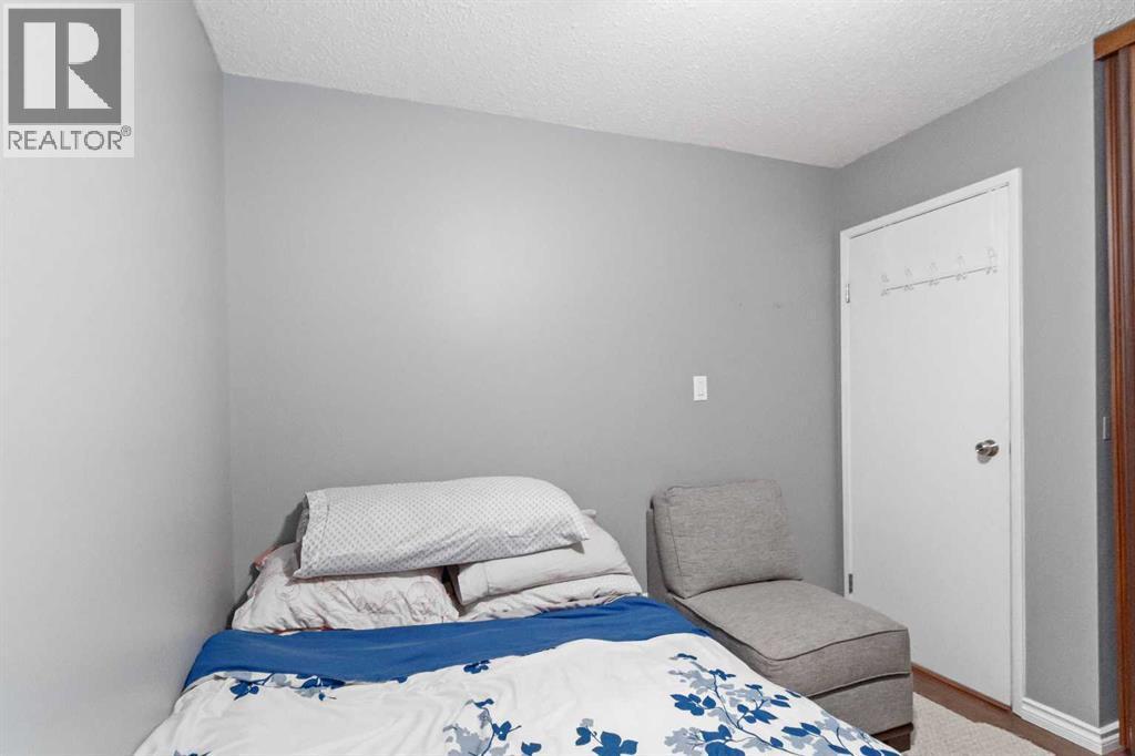 109 Ross Street, Fort Mcmurray, AB - Indoor Photo Showing Bedroom