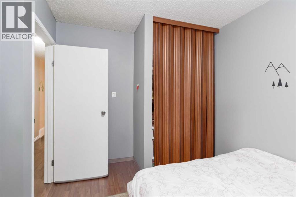 109 Ross Street, Fort Mcmurray, AB - Indoor Photo Showing Bedroom