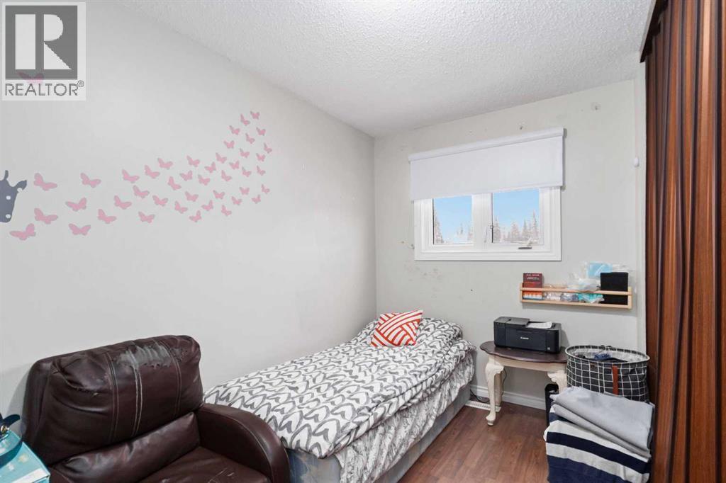 109 Ross Street, Fort Mcmurray, AB - Indoor Photo Showing Bedroom