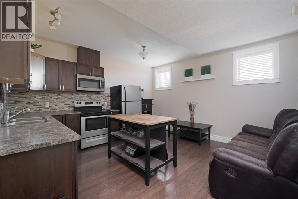 353 Walnut Crescent, Fort Mcmurray, AB - Indoor Photo Showing Kitchen With Double Sink
