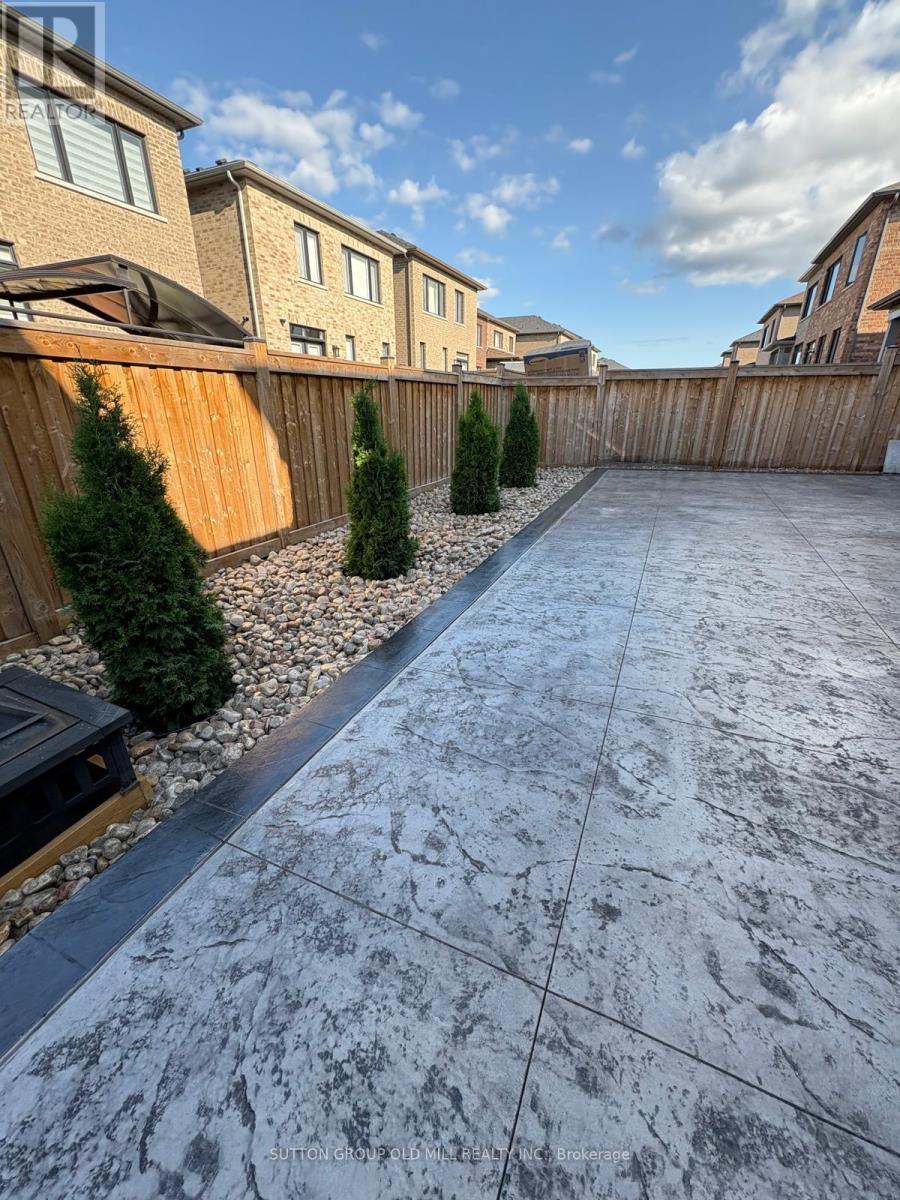 Backyard with Stamped Concrete and Rocks - 17 Bellefond Street, Vaughan, ON - Outdoor