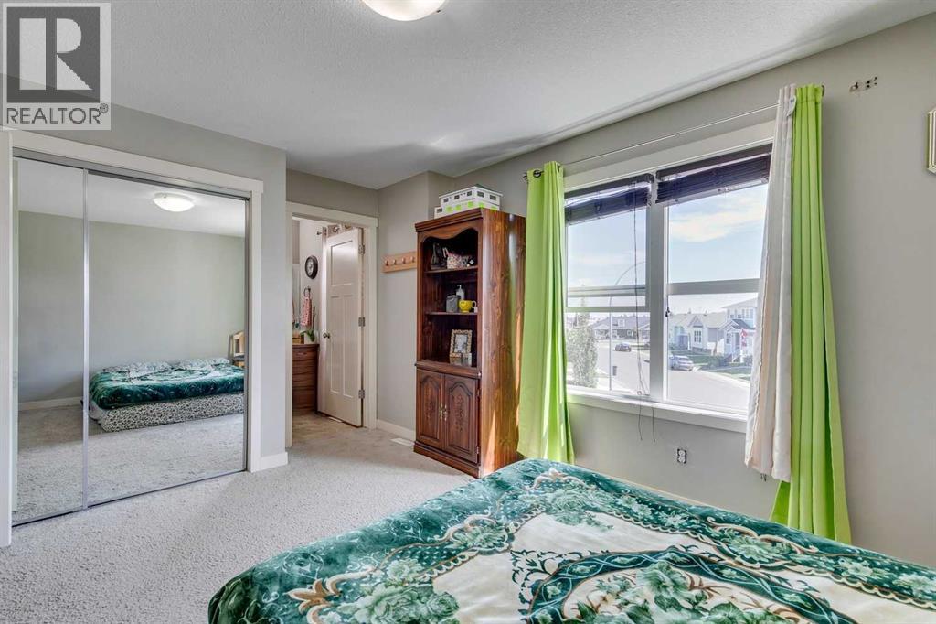 43 Sunrise Crescent Ne, High River, AB - Indoor Photo Showing Bedroom
