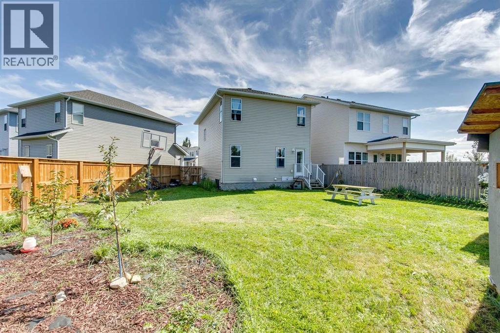 Summer Time Backyard - 43 Sunrise Crescent Ne, High River, AB - Outdoor With Exterior