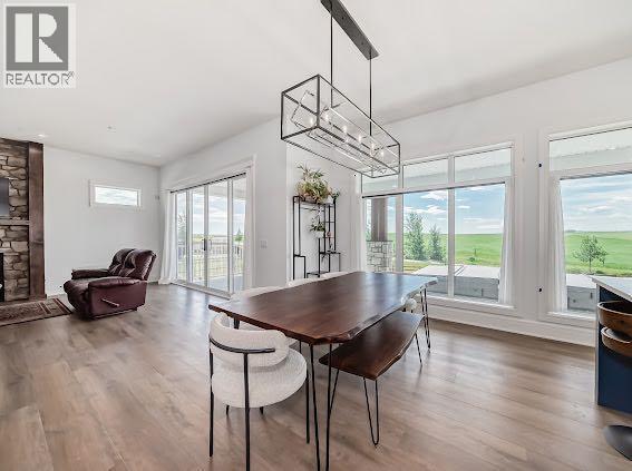 60 Junegrass Terrace, Rural Rocky View County, AB - Indoor Photo Showing Other Room With Fireplace