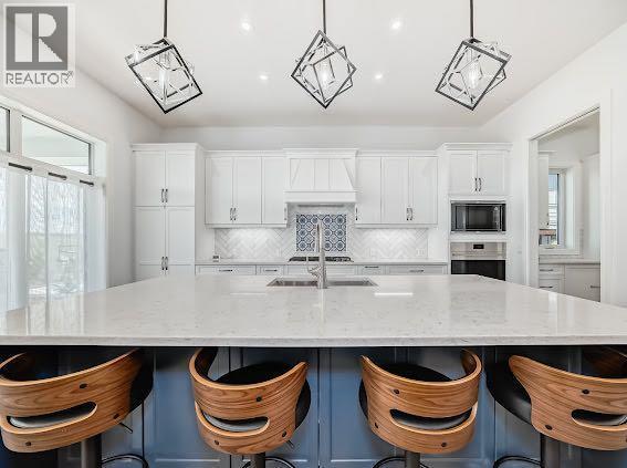 60 Junegrass Terrace, Rural Rocky View County, AB - Indoor Photo Showing Kitchen