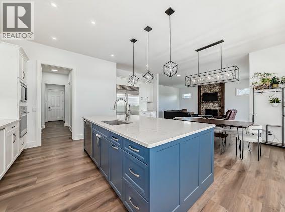60 Junegrass Terrace, Rural Rocky View County, AB - Indoor Photo Showing Kitchen With Upgraded Kitchen