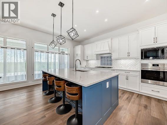 60 Junegrass Terrace, Rural Rocky View County, AB - Indoor Photo Showing Kitchen