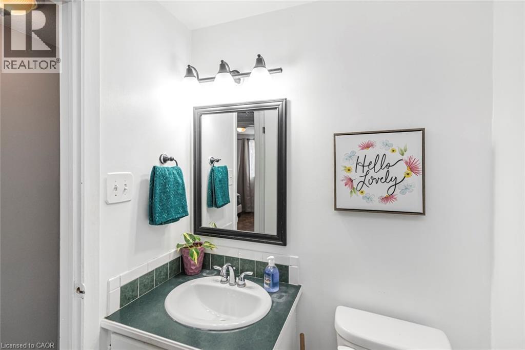Bathroom featuring vanity and toilet - 48 Riverdale Drive Unit# 2, Hamilton, ON - Indoor Photo Showing Bathroom